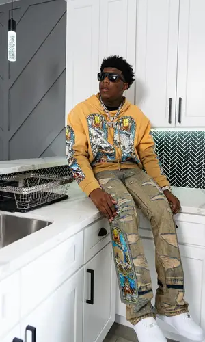 Yungeen Ace’s Outfit in Who Decides War Hoodie & Nike Sneakers (2024)