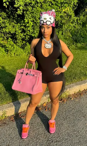Hennessy Carolina wearing Kizumi Worldwide hat