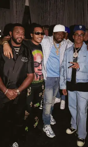 50 Cent’s Outfit in Dior Shirt, G-Star RAW Jeans & New Era Cap (2024)