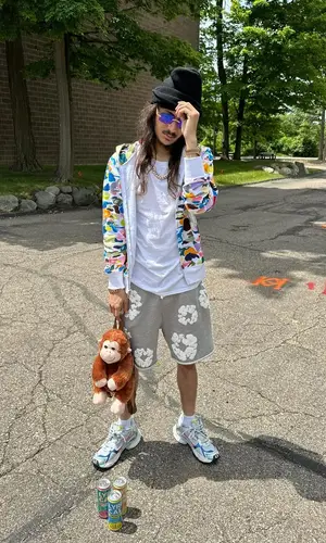 BabyTron wearing Denim Tears shorts