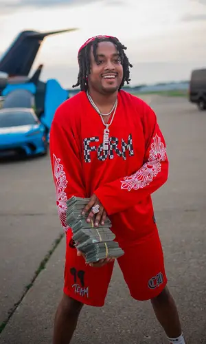 Tay B wearing Chrome Hearts jersey