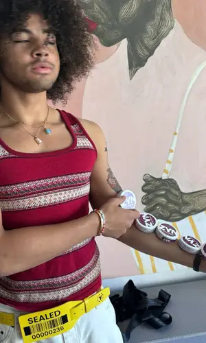 24kGoldn’s Outfit in Yami Miyazaki Belt, Cartier Jewelry & Button Network Gloves (2024)