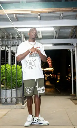 Bobby Shmurda’s Outfit in Fullypaid T-Shirt & Jordan Sneakers (2024)