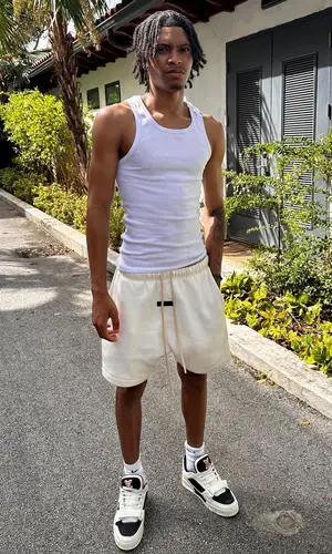 Nemzzz’s Outfit in Fear of God Shorts, Louis Vuitton Sneakers & Nike Socks (2024)