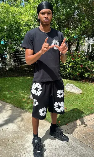 Nemzzz wearing Denim Tears t-shirt