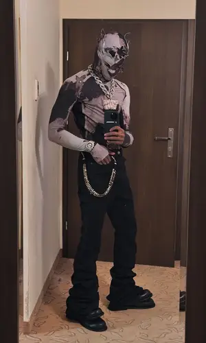 NLE Choppa wearing Kusikohc top
