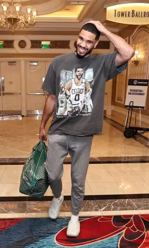 Jayson Tatum’s Outfit in Wins LA  T-Shirt, Goyard Bag & Jordan Sandals (2024)