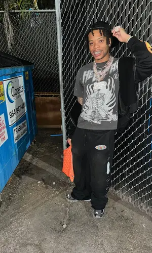 Lil Migo wearing Goyard bag