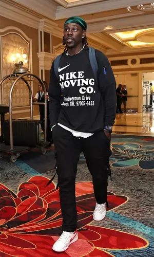 Jrue Holiday wearing Amiri pants