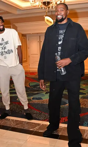 Kevin Durant’s Outfit in Balenciaga Shirt, Nike Sneakers & Travis Scott Merch (2024)