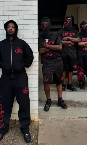 21 Savage wearing 21 Savage Merch t-shirt