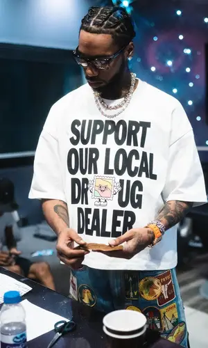 Key Glock wearing Kapital shorts