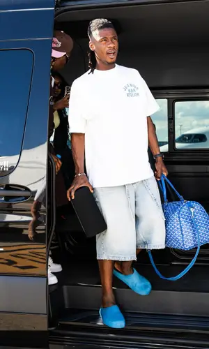 Eduardo Camavinga’s Outfit in Jeanius Bar Atelier T-Shirt, Goyard Bag & Marni Sandals (2024)