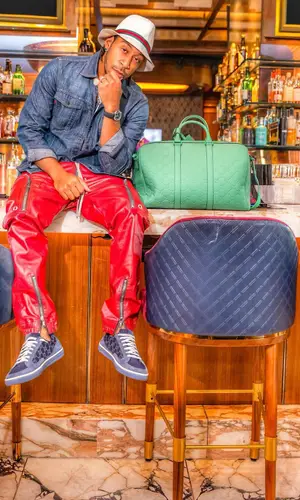Ludacris wearing Gucci bag