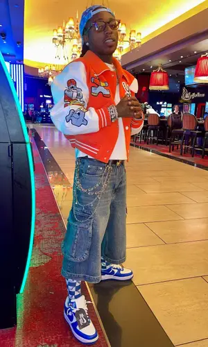 Jacquees’ Outfit in Nike Sneakers, Louis Vuitton Cap & Chrome Hearts Socks (2024)