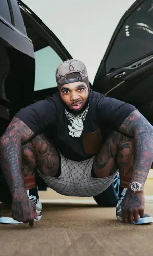 Kevin Gates wearing Alo Yoga shorts