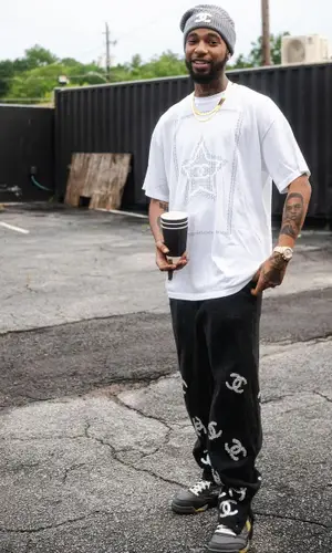 Key Glock wearing Chanel hat