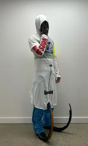 Killy wearing Comme Des Garcons pants