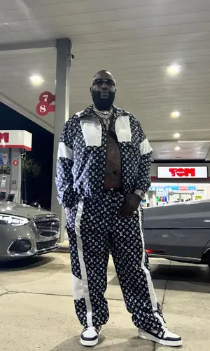 Rick Ross’ Outfit in Louis Vuitton Sneakers (2024)