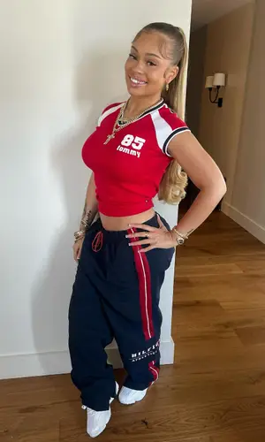Latto wearing Tommy Hilfiger top
