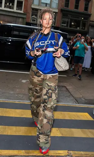 Rihanna’s Outfit in Amiri Pants, Puma Sneakers & Gucci Bag (2024)