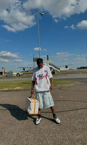 Travis Scott wearing Nike jersey