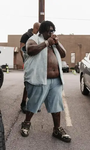 BigXthaPlug wearing Louis Vuitton sneakers