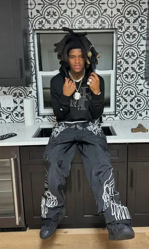 Kuttem Reese wearing Amiri hoody