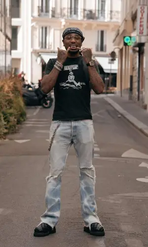 Quavo wearing Bottega Veneta boots