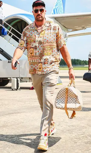 Travis Kelce wearing Bottega Veneta eyewear