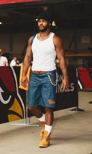 Kyler Murray wearing Louis Vuitton shorts