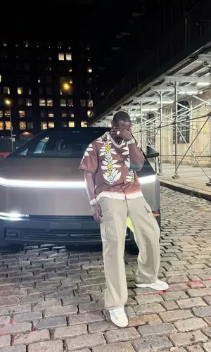 G4 Boyz Buggy wearing Prada shirt