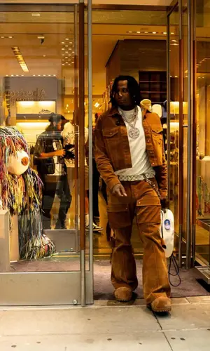Moneybagg Yo wearing Lof Brand pants