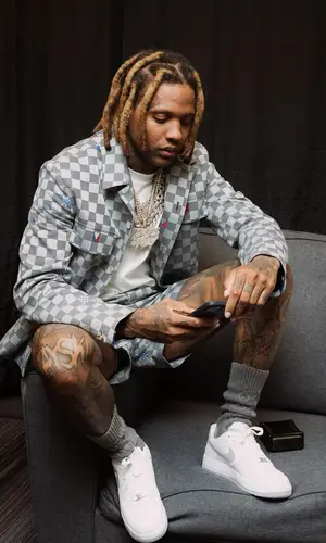 Lil Durk’s Outfit in Louis Vuitton Jacket & Nike Sneakers (2024)