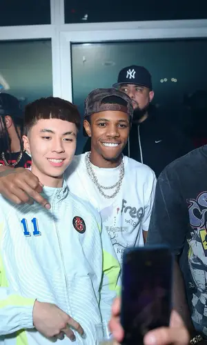 A Boogie Wit Da Hoodie wearing Chrome Hearts pants