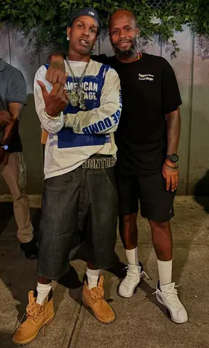 ASAP Rocky wearing ASAP Rocky Merch top