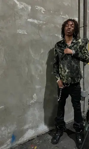 Lil Tecca wearing Chrome Hearts jewelry