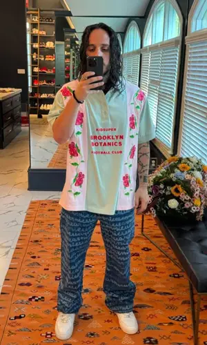 Russ’ Outfit in KidSuper Shirt, Marni Jeans & Nike Sneakers (2024)