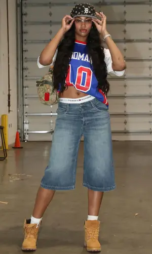 Angel Reese wearing Louis Vuitton bag