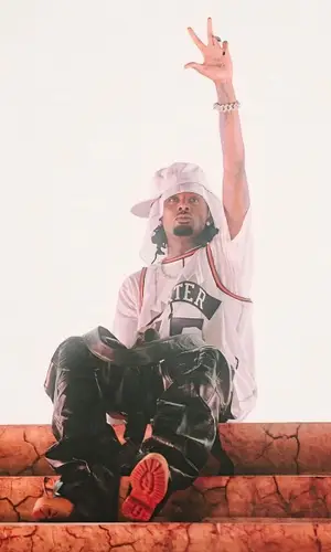 Playboi Carti wearing New Era cap