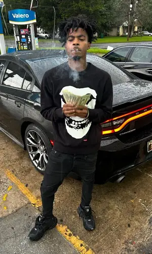 Lazer Dim 700 wearing Supreme top