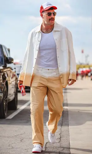 Travis Kelce wearing Bottega Veneta eyewear