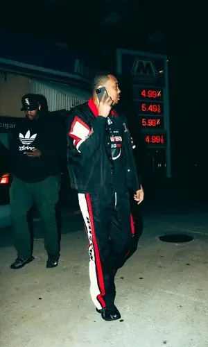 G Herbo wearing G Herbo Merch top