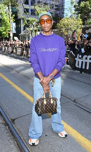 Pharrell Williams’ Outfit in Richard Mille Watch, Louis Vuitton Eyewear & Human Made Cap (2024)