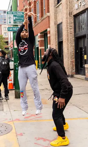 G Herbo wearing G Herbo Merch top