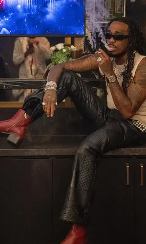 Quavo wearing Racer Worldwide belt