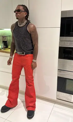 Gunna wearing Louis Vuitton boots