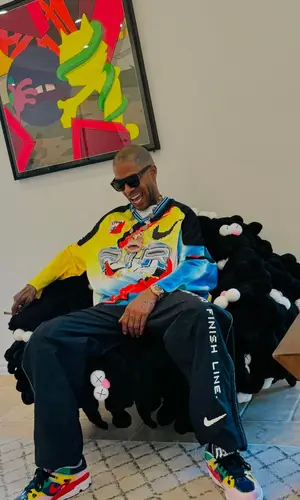 Kid Cudi’s Outfit in Nike Jersey, Retrosuperfuture Eyewear & Cactus Plant Flea Market (2024)