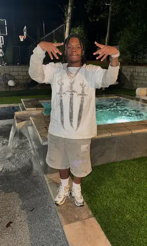 42 Dugg’s Outfit in Thug Club T-Shirt, Maison Mihara Yasuhiro Shorts & Chanel Sneakers (2024)