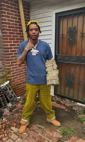 Lil Migo wearing Timberland boots